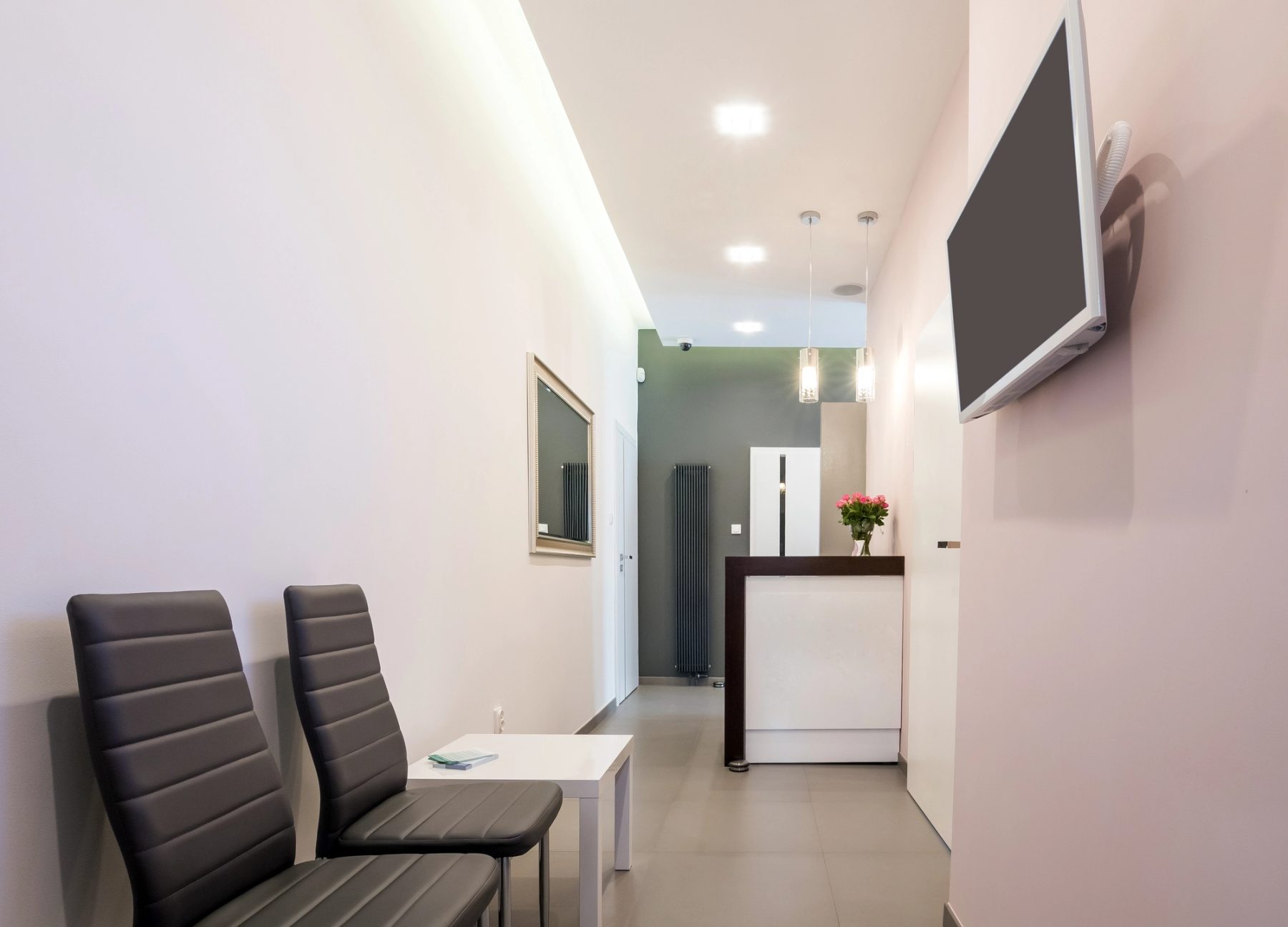 Reception desk and waiting area at Harmony Dental Studio